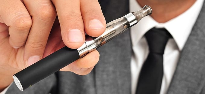 man holding Vaping Pen