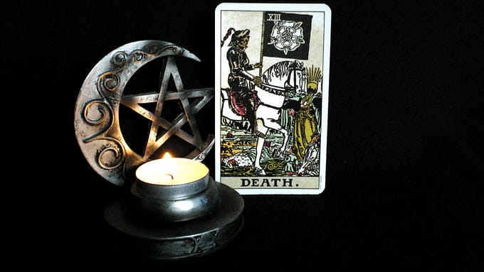 tarot card with candle